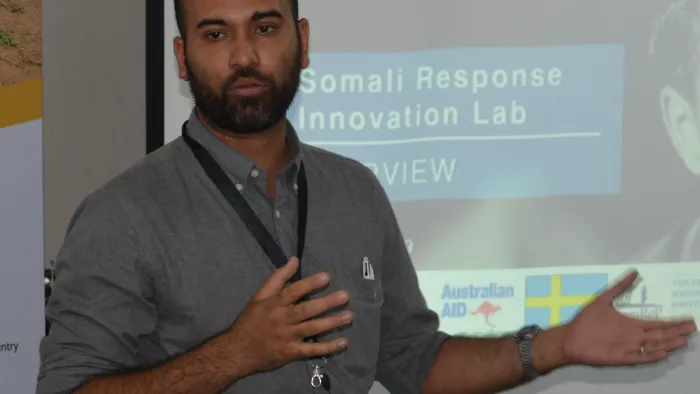 Nishant Das, giving a presentation.
