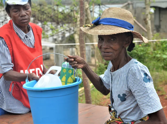 A woman collecting items from the distribution centre