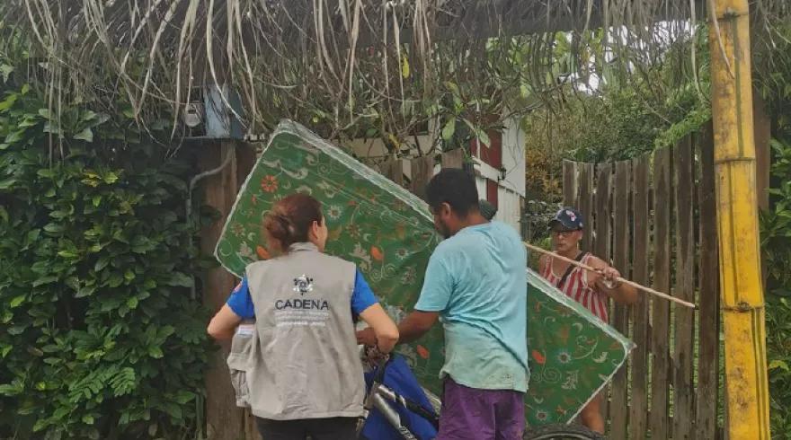 Humanitariam worker assisting a man seeking shelter