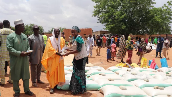 Women distributing food items