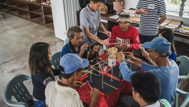 People constructing a model